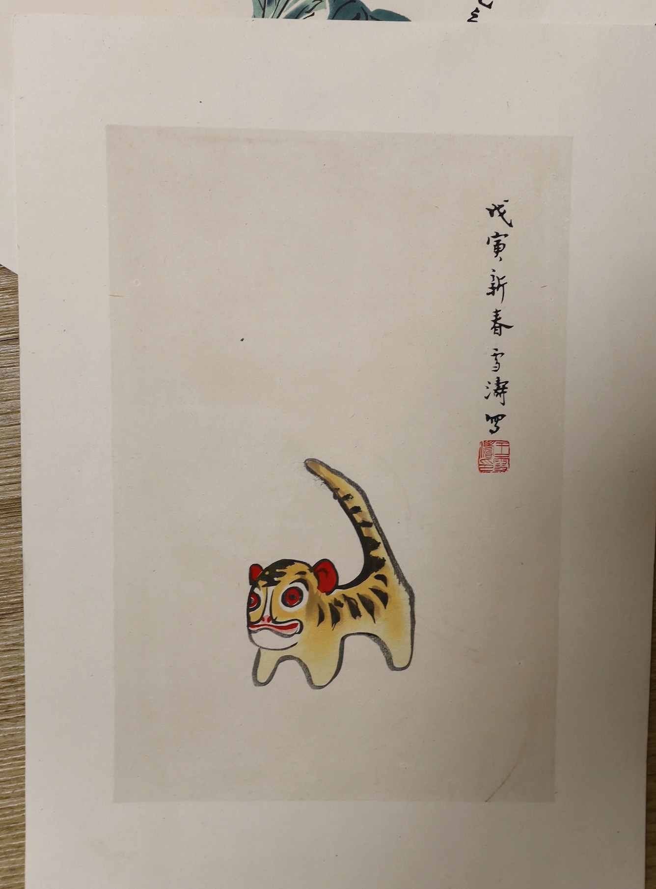 An album of Chinese prints, dated 1954 including Qi Baishi